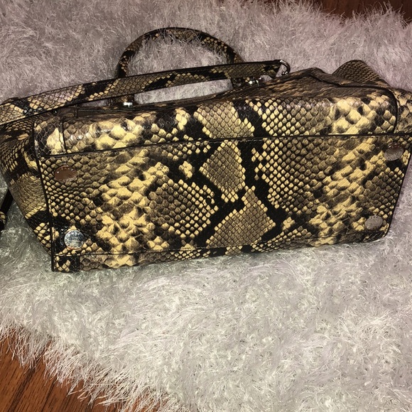 Michael Kors python purse
Michael Kors Collection - Picture 9 of 16